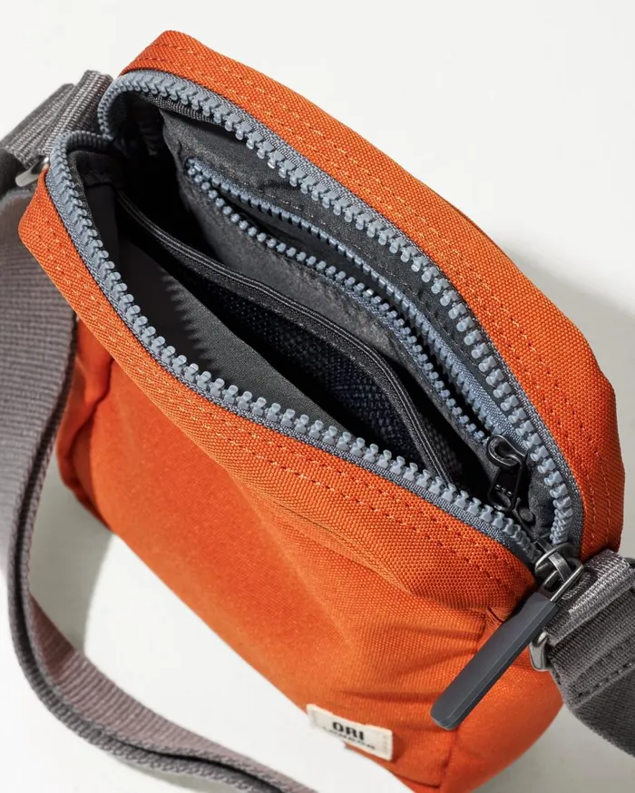 Tommy Bahama Bond Atomic Orange Canvas Crossbody Oriatomic Orange WomenMenBig and TallBeach and Home Handbags and Clutches Tommy Bahama Bond Atomic Orange Canvas Crossbody Oriatomic Orange WomenMenBig and TallBeach and Home Handbags and Clutches