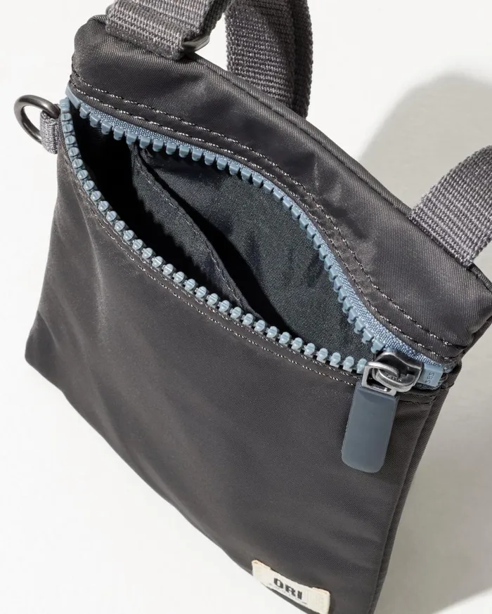 Tommy Bahama Chelsea Graphite XSmall Crossbody Graphite WomenMenBig and TallBeach and Home Handbags and Clutches Tommy Bahama Chelsea Graphite XSmall Crossbody Graphite WomenMenBig and TallBeach and Home Handbags and Clutches