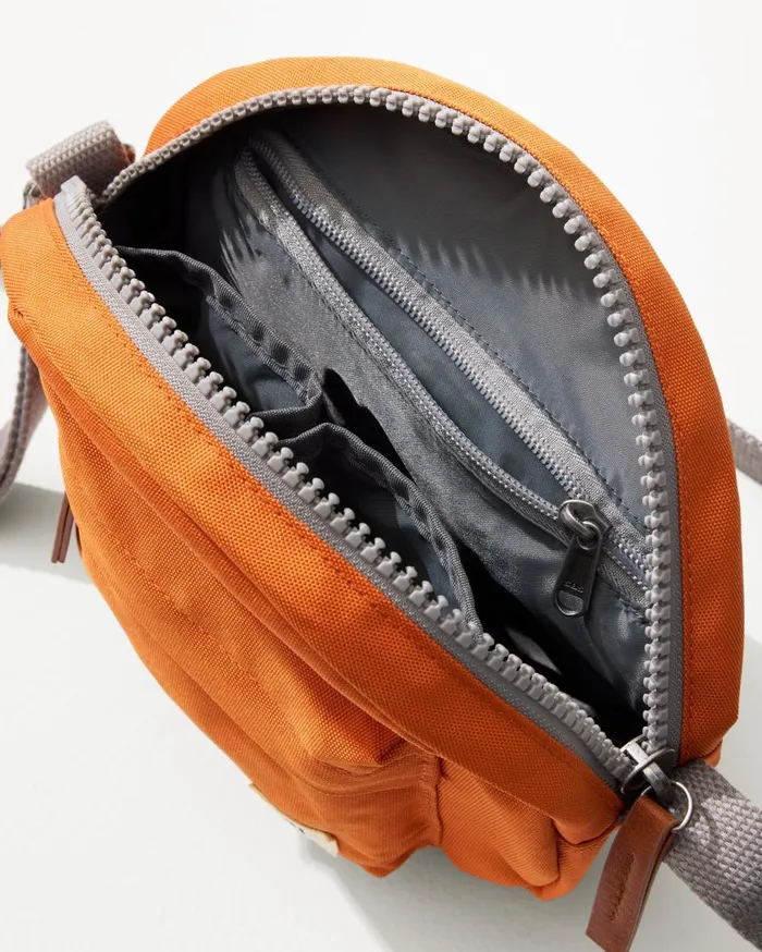 Tommy Bahama Paddington Atomic Orange Crossbody Bag Atomic Orange WomenMenBig and TallBeach and Home Handbags and Clutches Tommy Bahama Paddington Atomic Orange Crossbody Bag Atomic Orange WomenMenBig and TallBeach and Home Handbags and Clutches